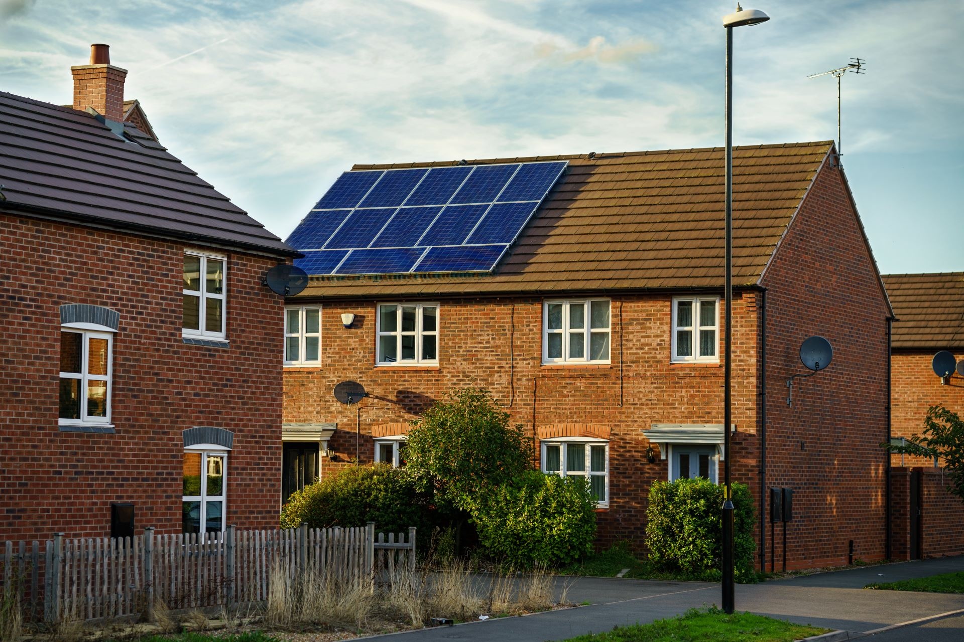 HOAs install arrays of solar panels on their roofs.