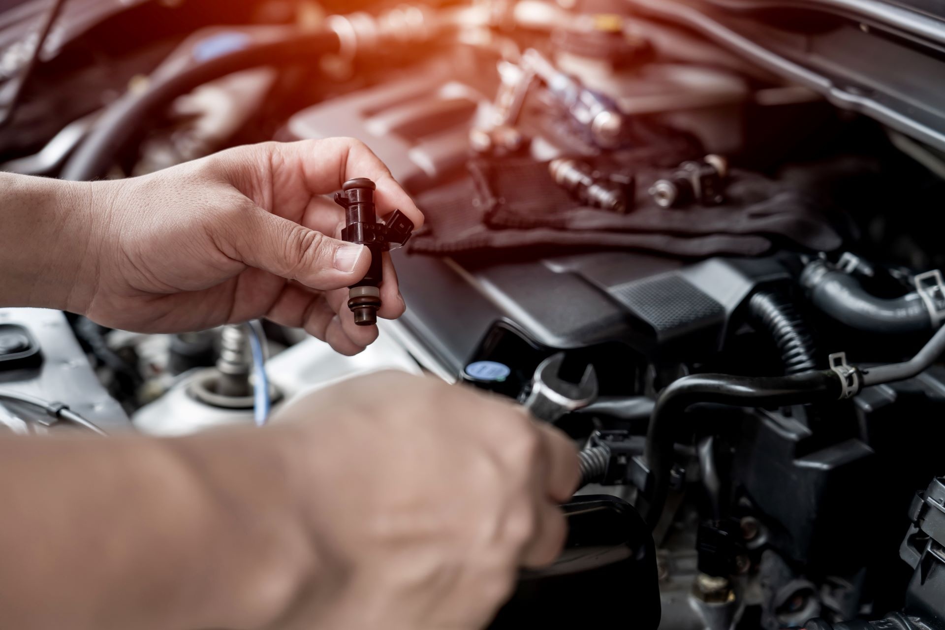 Hands working on solar-powered off-roader