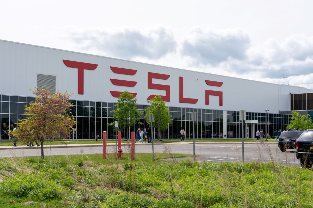 Staff were pictured celebrating at the company’s Gigafactory Texas in Austin.