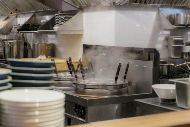 The photo showed 20 huge serving trays piled full of food, mostly entrées.