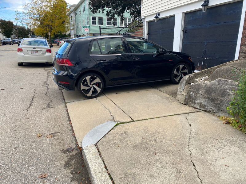 "Every single one of these cars blocking the sidewalk is parked in front of a perfectly good garage."