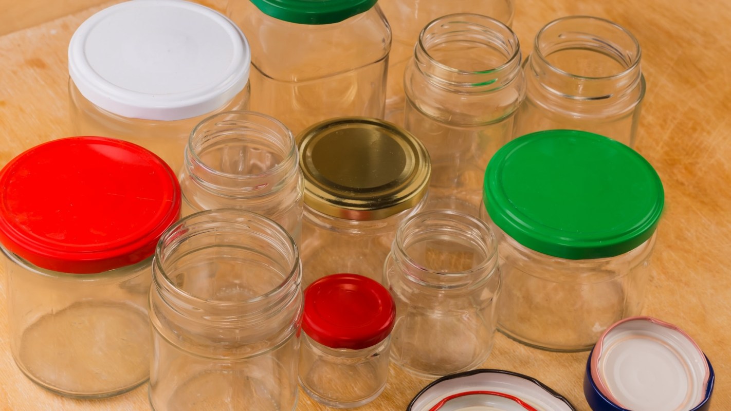 A pasta sauce jar provides a sturdy glass to mix a creative coffee brew.