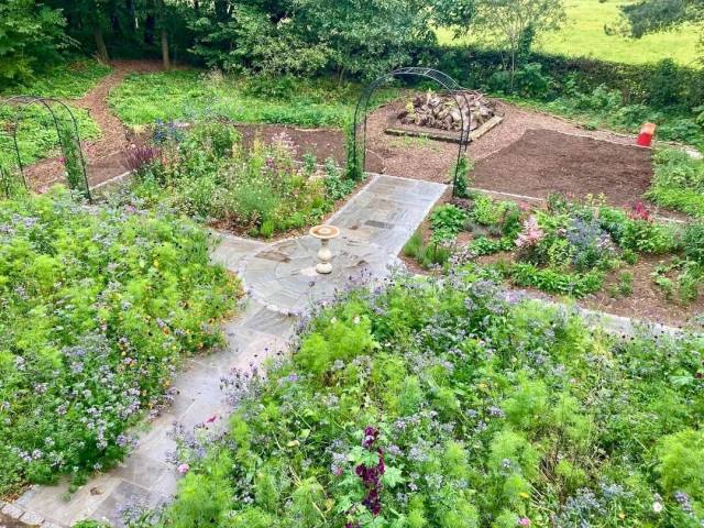"We settled on the idea of having a formal garden surrounded by more informal woodland paths and beds."