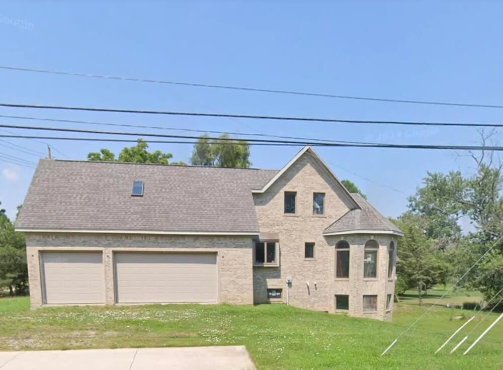"So many unfinished brick McMansions around."