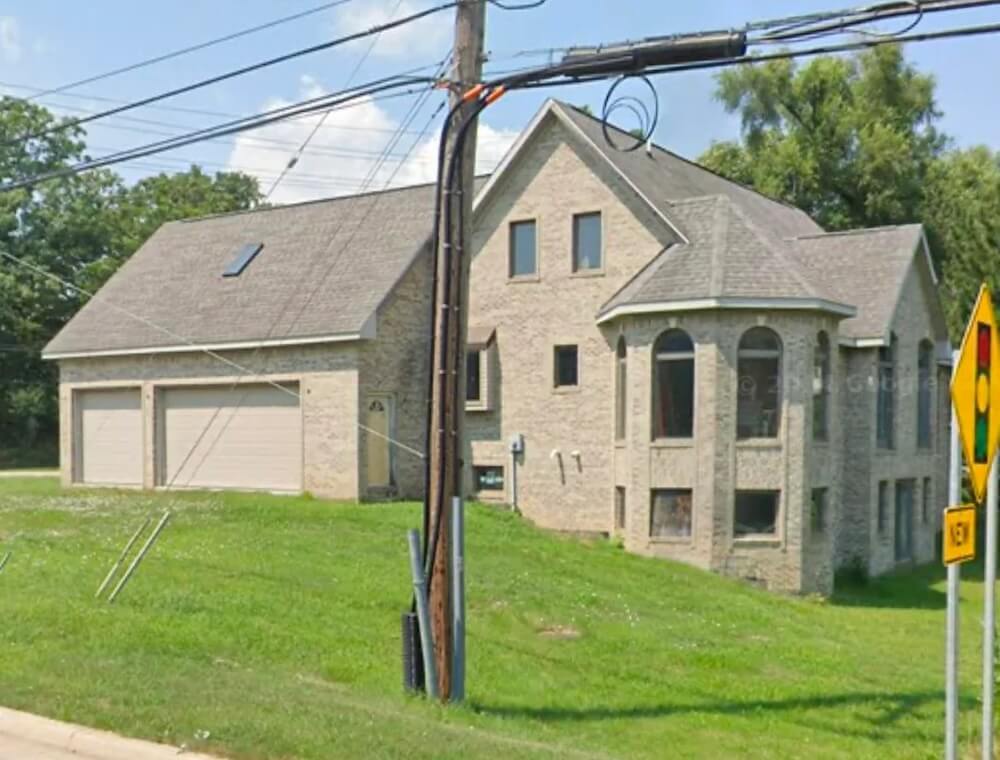 "So many unfinished brick McMansions around."