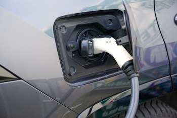 "Can a board require use of a specific vendor for EV charging?"