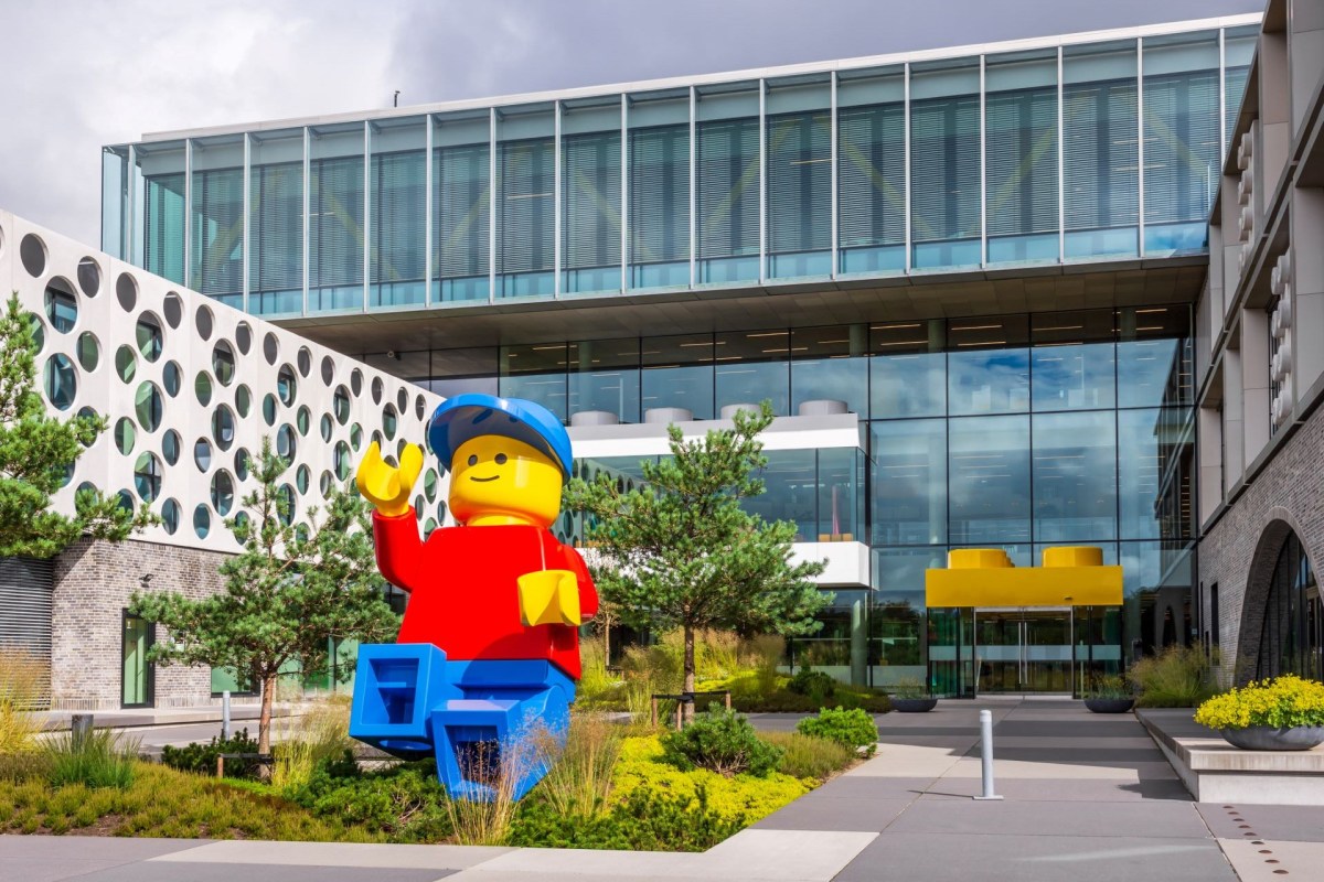 Inside the factory, highly advanced robots make colorful bricks with incredible precision.
