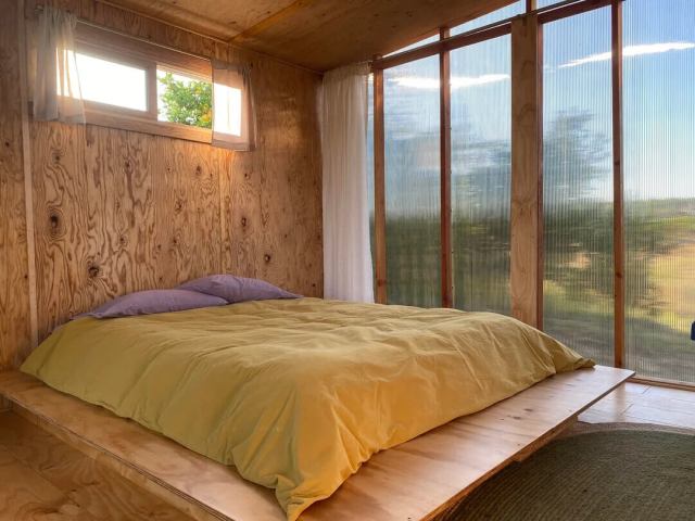 The user posted their progress on the cabin after two months of hard work.