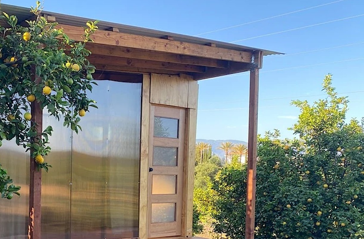 The user posted their progress on the cabin after two months of hard work.