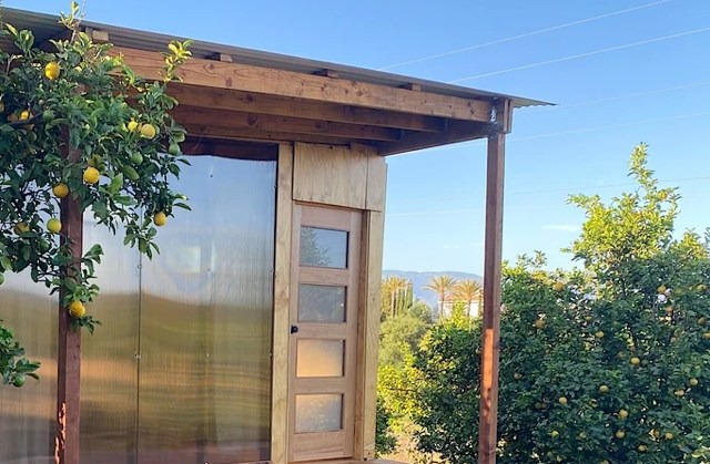 The user posted their progress on the cabin after two months of hard work.