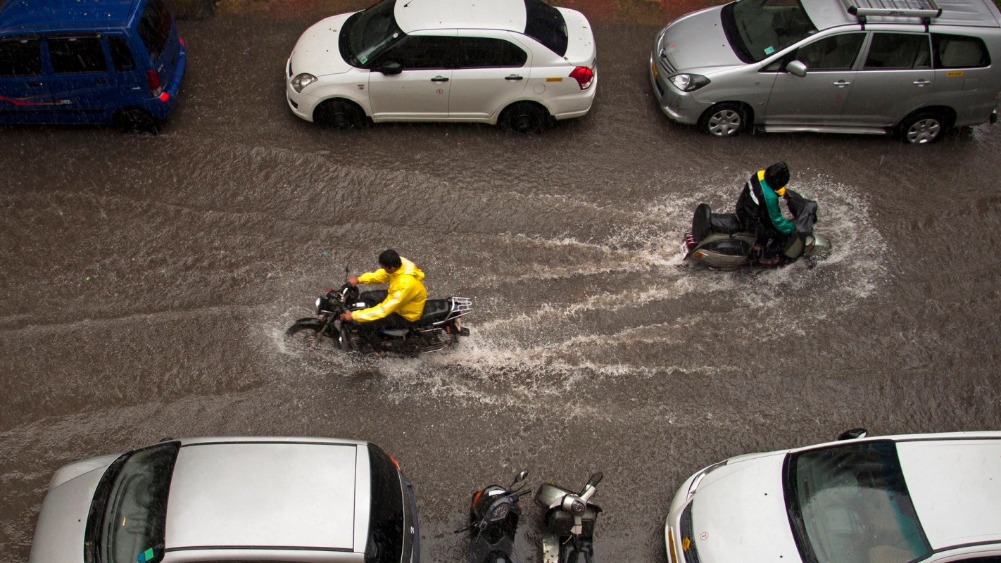 Video clips showed water pouring down staircases, gushing through train platforms, and leaving travelers wading knee-deep.